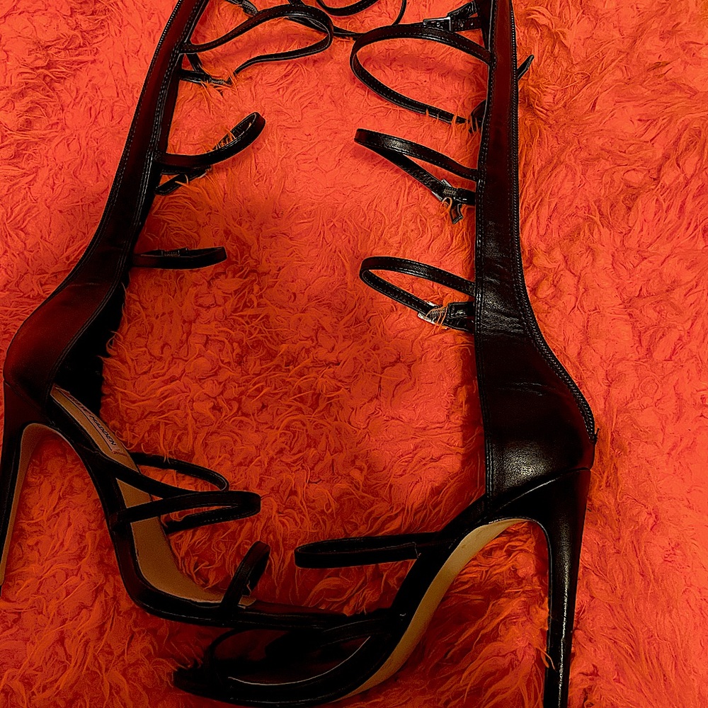 Black strap up heels